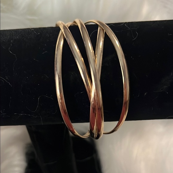 Elegant Gold Tone Criss Cross Bangle Bracelet. - Picture 3 of 3